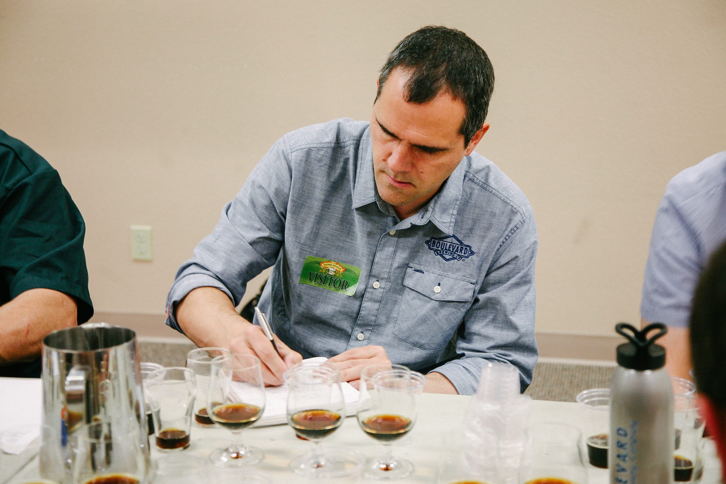 Boulevard Brewing's Steven Pauwels taking notes during a beer-blending session for Terra Incognita