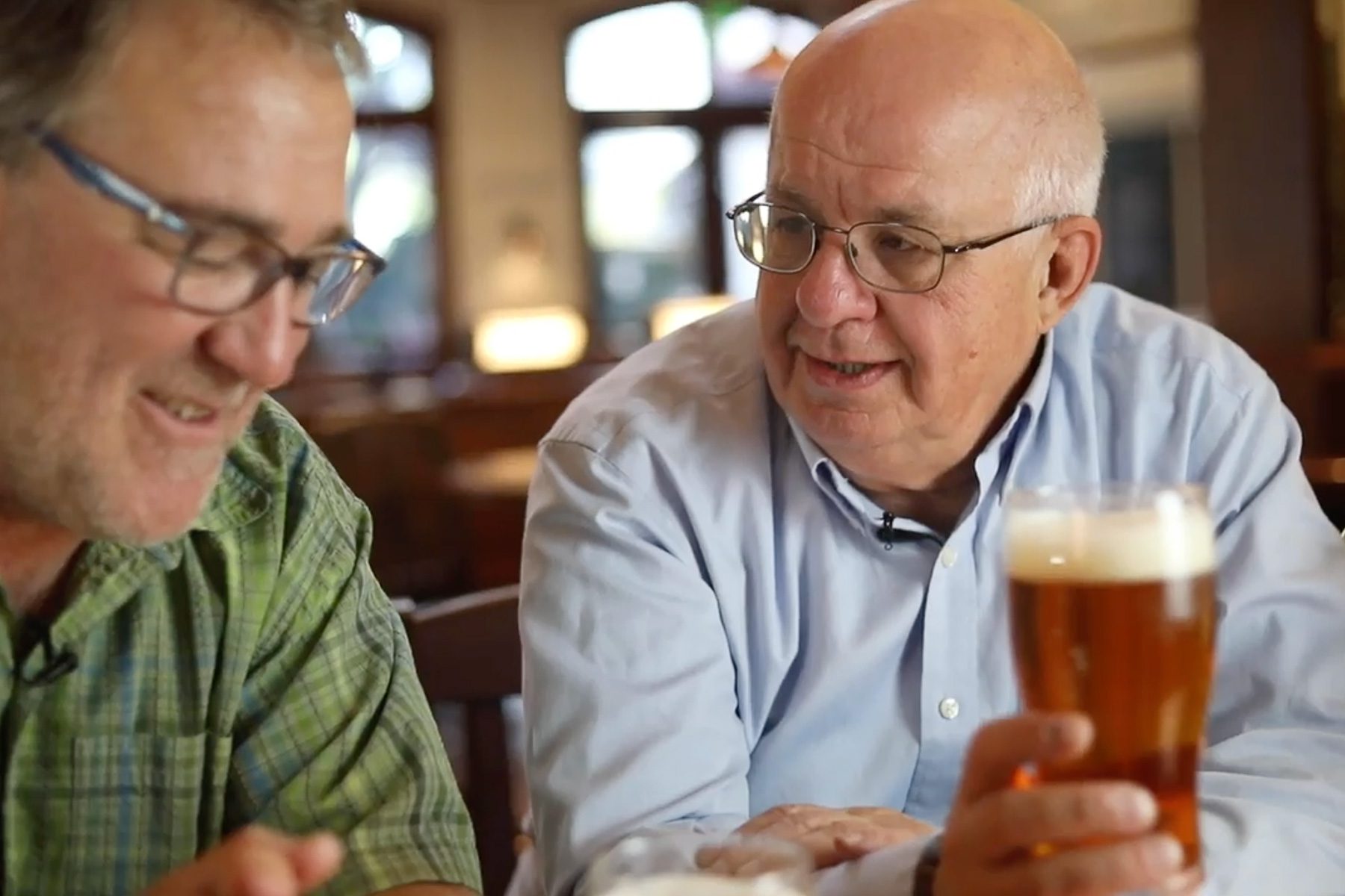 Terence Sullivan of Sierra Nevada Brewing Company drinking beer with brewing scientist Charlie Bamforth