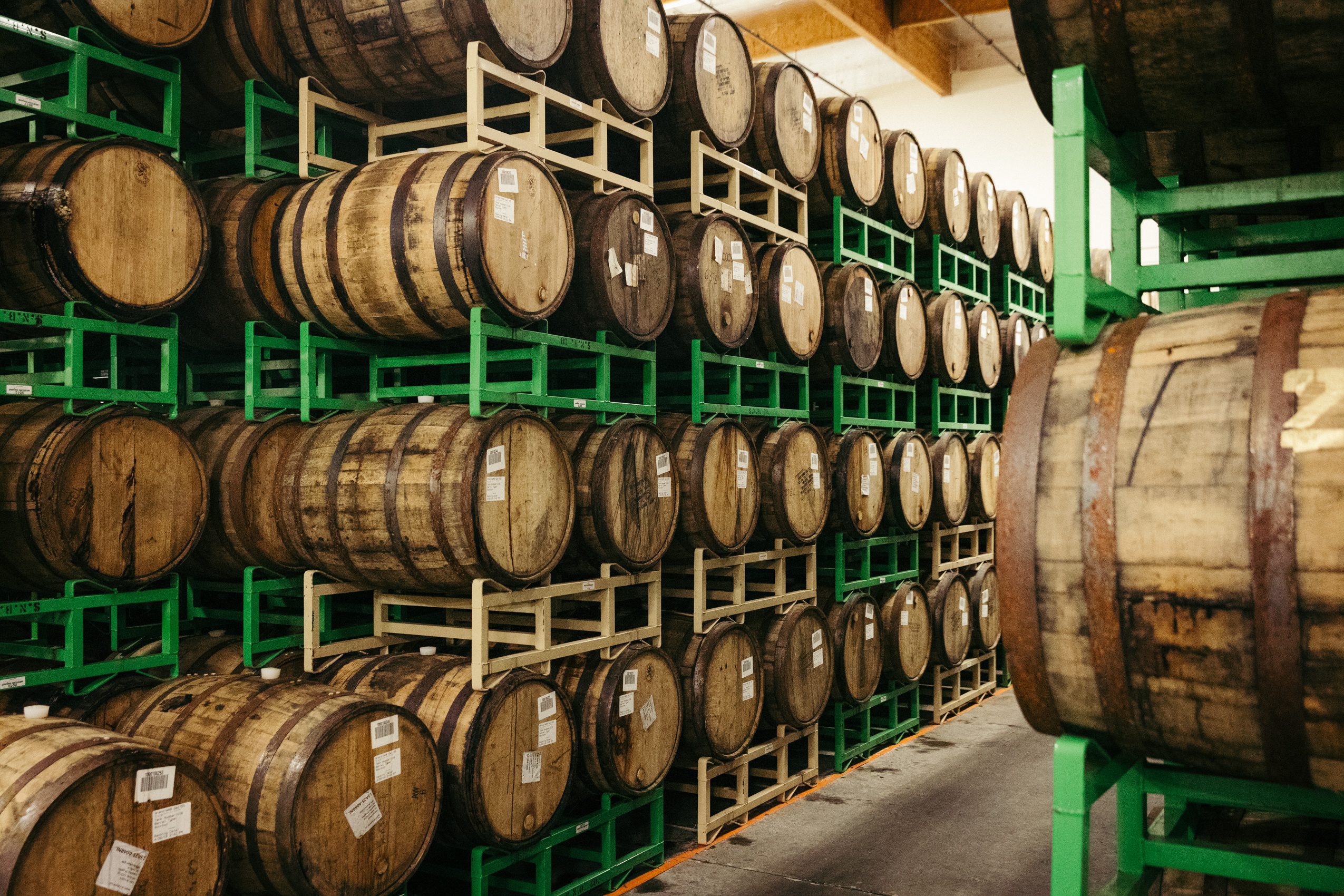 Stacks of barrel aged beer in wooden barrels at Sierra Nevada Brewing Company
