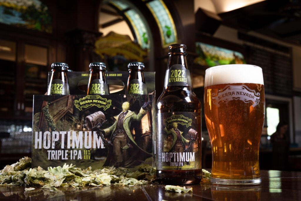 Hoptimum Triple IPA bottled six pack and beer glass
