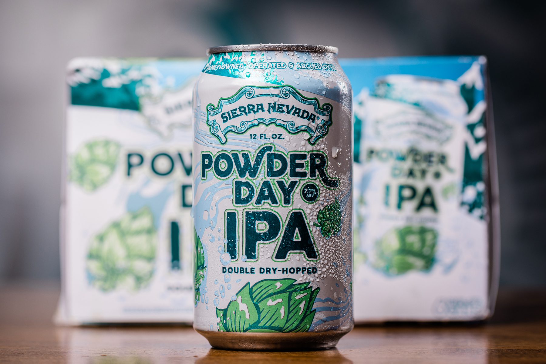 A can and six-pack of Powder Day IPA