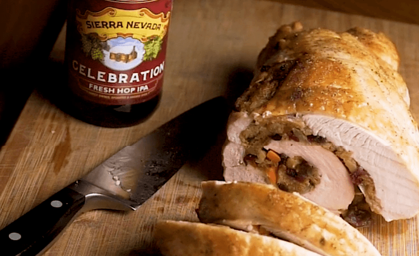 Bottle of Celebration IPA next to stuffed turkey breast