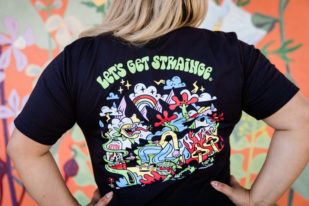 The back of a Strainge Beast T-shirt designed by artist Hannah Eddy